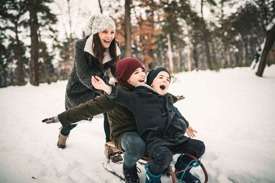 mom and sons sledding 1