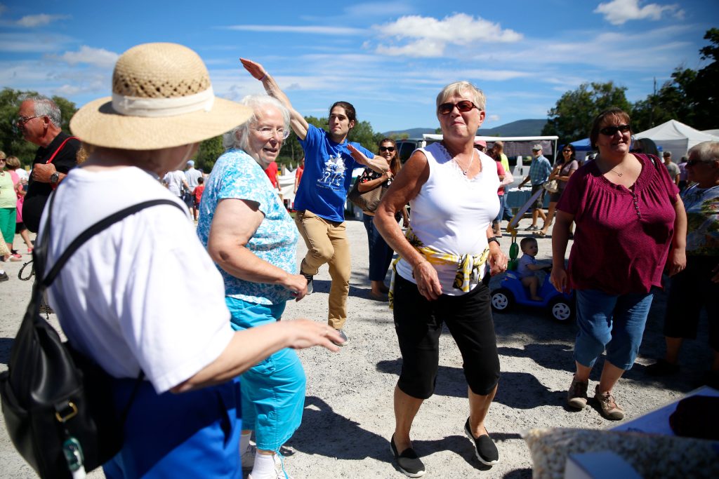 2014 Groups of visitors dance to the music at the welcome tent during the 19th annual Southern Vermont Garlic and Herb Festival on Saturday and Sunday in Bennington 1024x683 3