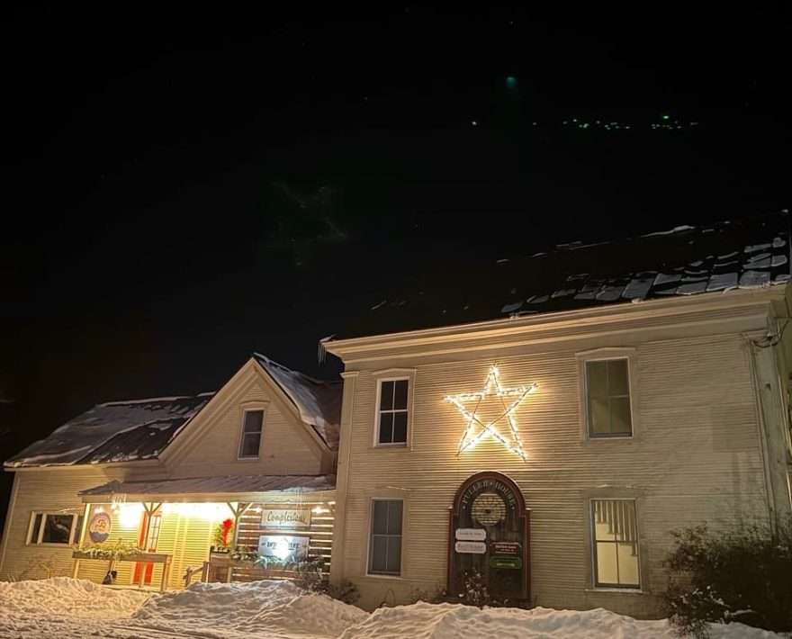 A business in Vermont decorated with a wooden Christmas Star, a Mad River Valley Tradition