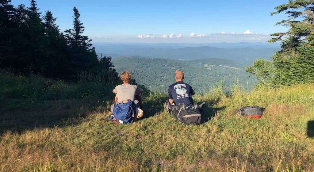 Two friends hiking in Vermont